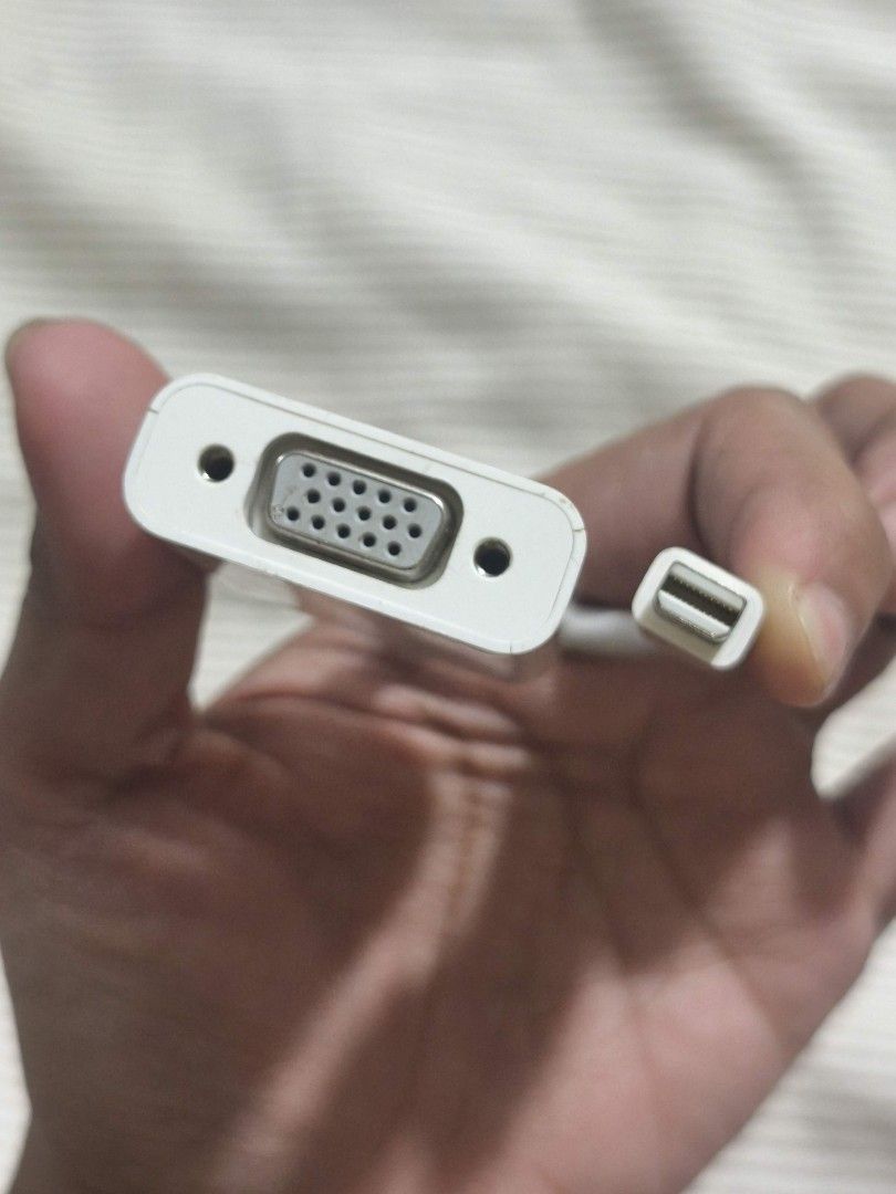 Apple Mini DisplayPort to VGA Adapter (Model A1307) (Category: Cables & Adaptors) located in Taguig. Submitted by juliestjuly (Listing ID 1461159739, Image 1). Description: The Input: A male Mini DisplayPort connector (also fully compatible with Thunderbolt 1 and Thunderbolt 2 ports found on legacy Macs). The Output: A female 15-pin VGA port used to mirror or extend your screen onto a standard analog monitor, projector, or older LCD display. Perf