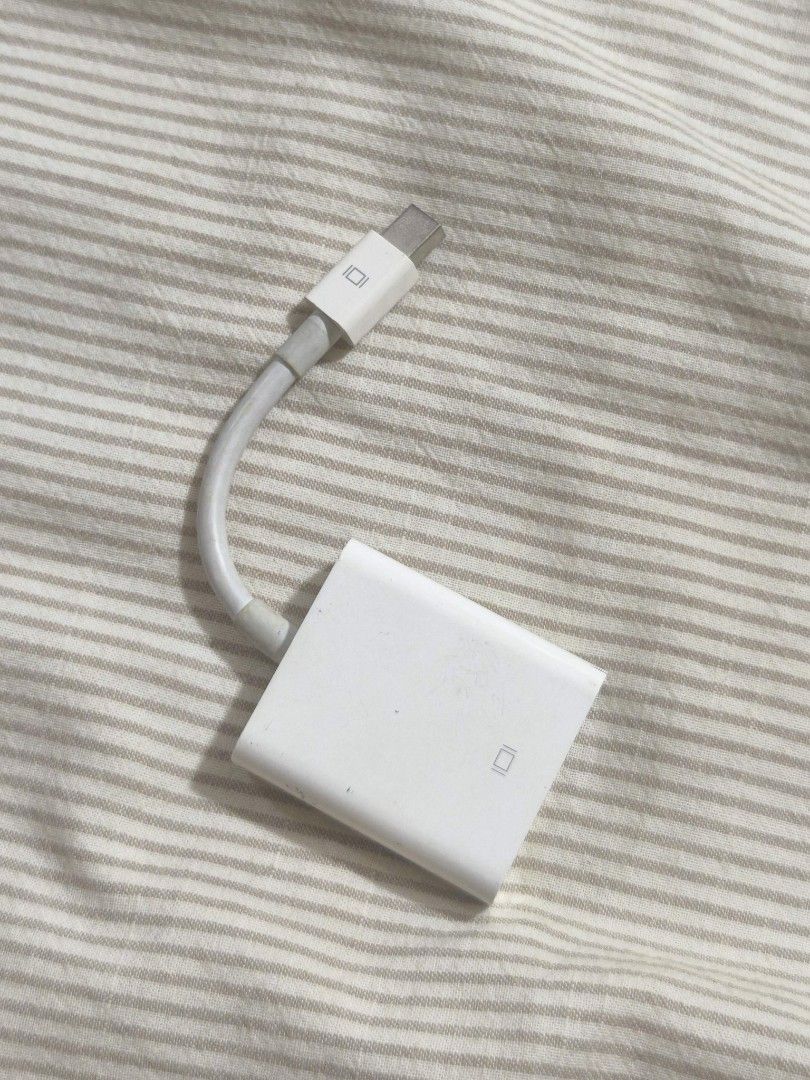 Apple Mini DisplayPort to VGA Adapter (Model A1307) (Category: Cables & Adaptors) located in Taguig. Submitted by juliestjuly (Listing ID 1461159739, Image 2). Description: The Input: A male Mini DisplayPort connector (also fully compatible with Thunderbolt 1 and Thunderbolt 2 ports found on legacy Macs). The Output: A female 15-pin VGA port used to mirror or extend your screen onto a standard analog monitor, projector, or older LCD display. Perf