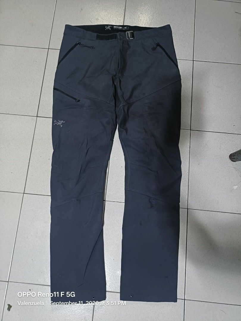Arc'teryx Softshell Pants Men's L/G (Category: Trousers) located in Valenzuela. Submitted by thrift_ko_cedie222 (Listing ID 1461154390, Image 1). Description: - Arc'teryx softshell pants - Color: Dark Grey - Size: L/G - Features zippered pockets - Durable material, great for outdoor activities - Ready for your next adventure.