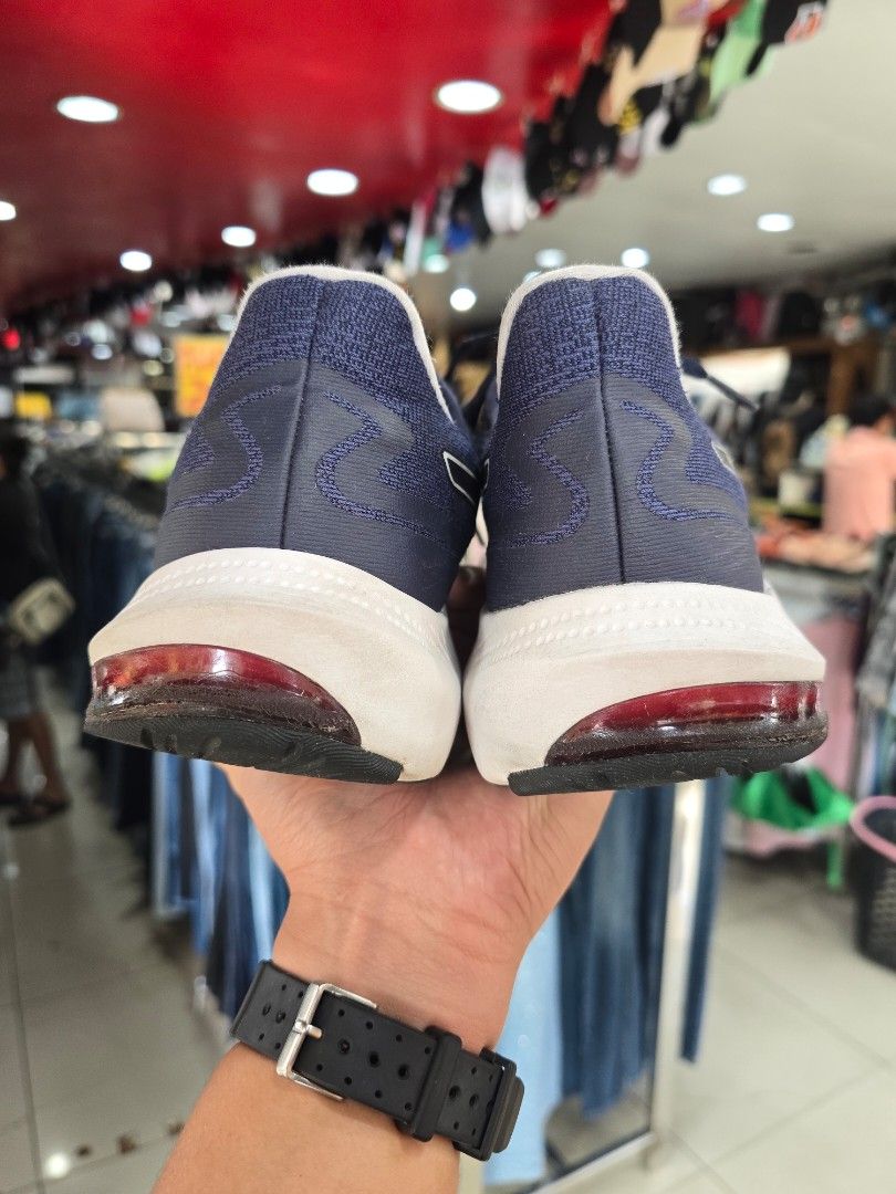ASICS GEL-PULSE 14 (Category: Sneakers) located in Iba. Submitted by conditionexcellente (Listing ID 1461188862, Image 3). Description: - ASICS GEL-PULSE 13 Running Shoes - Color: Navy blue with white and blue accents - Midsole: AmpliFoam for cushioning - Sole: Excellent grip for stability - Size: 10 UK / 11.5 US / 46 EU - Origin: Made in Vietnam.