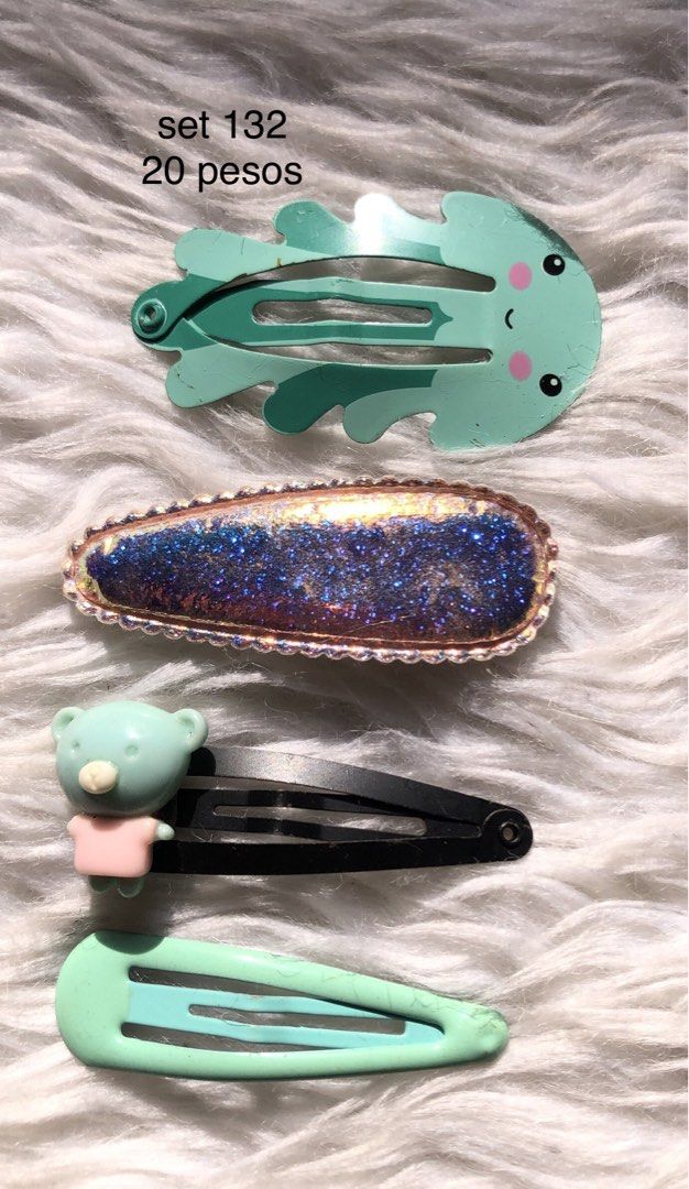 Assorted Hair Clips Set - 20 Pesos Each Set (Category: Hair Accessories) located in Taguig. Submitted by nikikaystuff (Listing ID 1461319081, Image 3). Description: - Assorted hair clips sets available. - Features a variety of fun designs: emojis, animals, stars, bows, and more. - Comes in a mix of vibrant colors. - Ideal for children's hairstyles. - Adds a touch of fun and personality to any outfit..
