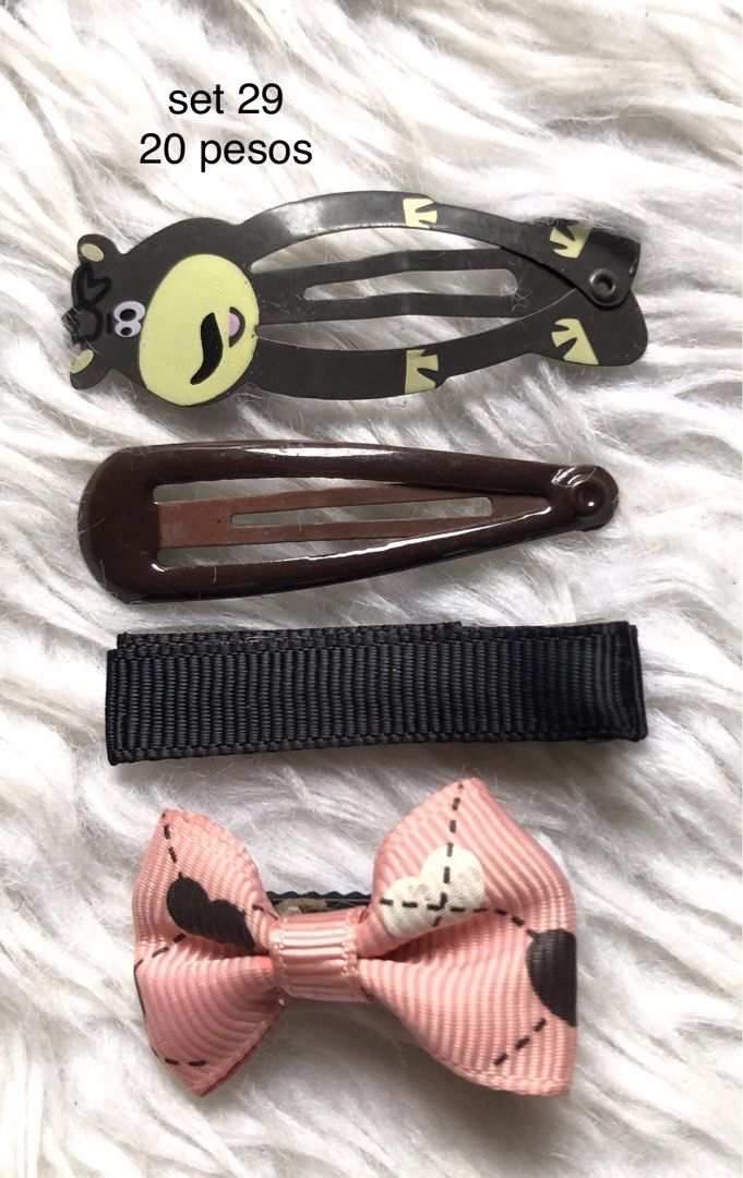 Assorted Hair Clips Sets - 20 Pesos Each (Category: Hair Accessories) located in Taguig. Submitted by nikikaystuff (Listing ID 1461318960, Image 3). Description: - Assorted hair clip sets - 4 clips included per set - Available designs: Peppa Pig, teddy bear, plain, and glittery styles - Ideal for everyday use or for kids - Affordable price: P20 per set.
