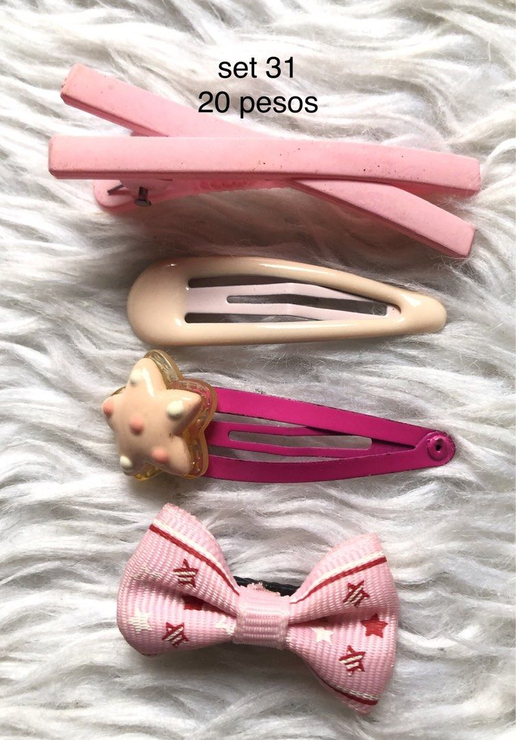 Assorted Hair Clips Sets - 20 Pesos Each (Category: Hair Accessories) located in Taguig. Submitted by nikikaystuff (Listing ID 1461319096, Image 2). Description: - Adorable hair clip sets available. - Priced at just 20 pesos per set. - Ideal for kids or anyone who loves cute hair accessories. - Mix and match to create various hairstyles. - Get a set or two today!.