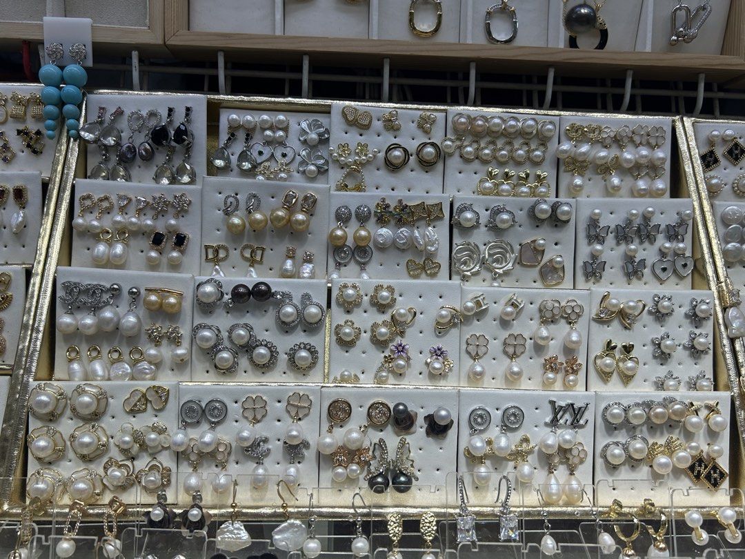 Assorted Pearl and Gemstone Earrings Collection (Category: Earrings) located in Cainta. Submitted by vastrabbit_d4dda6 (Listing ID 1461151960, Image 1). Description: Selling a variety of earrings. Lots of pearl styles, some with gold and silver accents. Also have some with colorful gemstones like green and blue. Different sizes and designs available. Great for matching with different outfits. Check out the photos for all the options..
