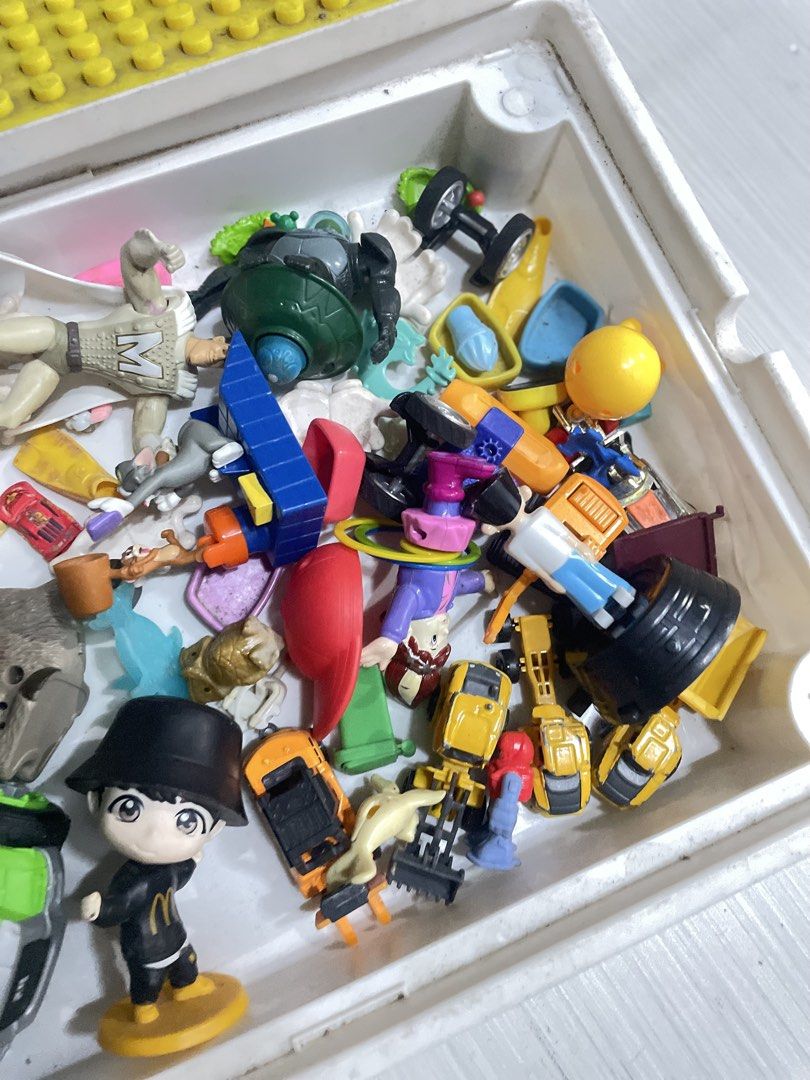 Assorted Toy Bundle with Building Blocks and Figures (Category: Lego & Building Sets) located in Quezon City. Submitted by prelovedclotheskimukays (Listing ID 1461265006, Image 3). Description: - Assorted toy collection perfect for imaginative play! - Includes various action figures. - Features toy vehicles: a green truck and yellow construction vehicles. - Comes with building block base plates. - Also includes a deer figure and a McDonald's char