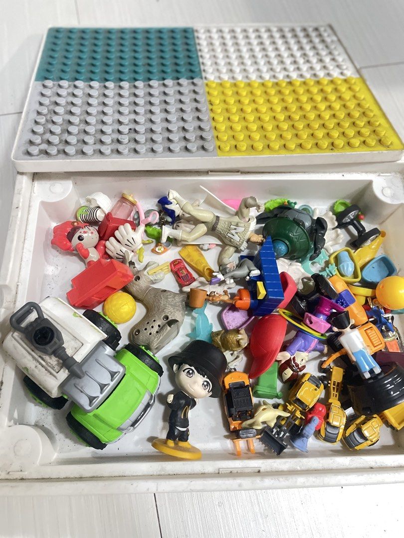Assorted Toy Bundle with Building Blocks and Figures (Category: Lego & Building Sets) located in Quezon City. Submitted by prelovedclotheskimukays (Listing ID 1461265006, Image 1). Description: - Assorted toy collection perfect for imaginative play! - Includes various action figures. - Features toy vehicles: a green truck and yellow construction vehicles. - Comes with building block base plates. - Also includes a deer figure and a McDonald's char