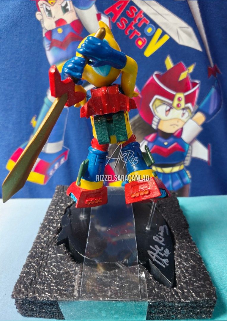 Astro V Action Figure Toy (Category: Designer & Blind Box Toys) located in Manila. Submitted by aterizz (Listing ID 1461182505, Image 2). Description: - Astro V Art toy by Ate Rizz Remember staring at your favorite '90s snack wrapper, wishing the robot on the front was a real toy? We made it happen. From iconic vintage snack packaging to a premium 3D-printed art toy—Astro V: Choco Bot Special Edition is officially AVAILABLE NOW! 100% Original Con