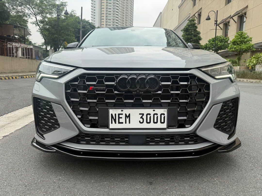 Audi RSQ3 2022 jackani Auto (Category: Used Cars) located in Pasig City. Submitted by jackani (Listing ID 1461147984, Image 2). Description: 2022 AUDI RSQ3 Local PGA Unit Full options Nardo grey Bucket seats Sonos sounds Digital Gauge Diamond stitches Alcantara inserts Forged carbon trims Big Brake Kit 6,000 mileage Upgrades: Maxton Full Bodykit 21” Brixton Forged CM5-R Wheels Michellin Tires Eventuri Carbon Intake Supersprint full exhaust Full B