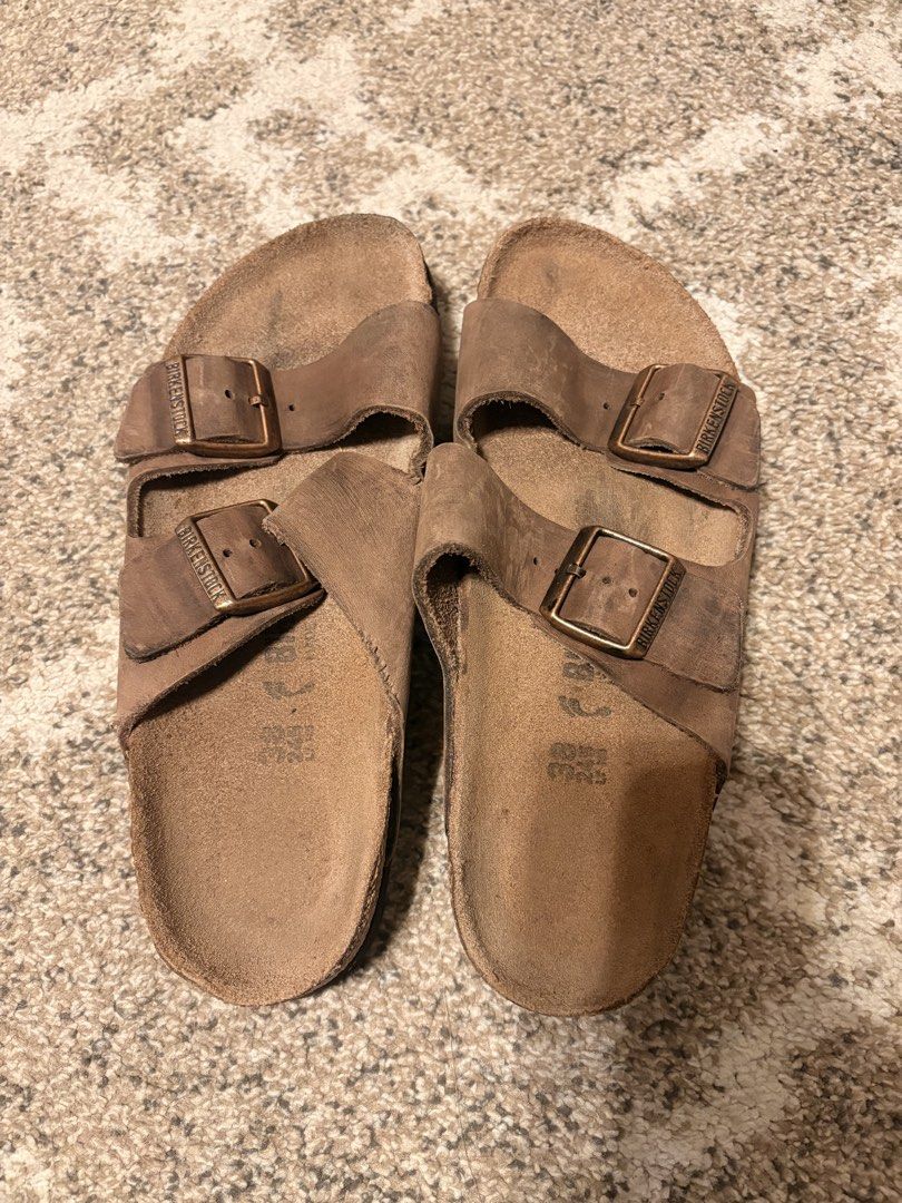 Auth Preloved Birkenstock Arizona (Category: Slippers and slides) located in Paranaque City. Submitted by silentstone.dolphin (Listing ID 1461295592, Image 2). Description: Oiled Leather Material.. Brass Buckle.. Brown Color.. Size 37N.. Super Nice in actual😍.