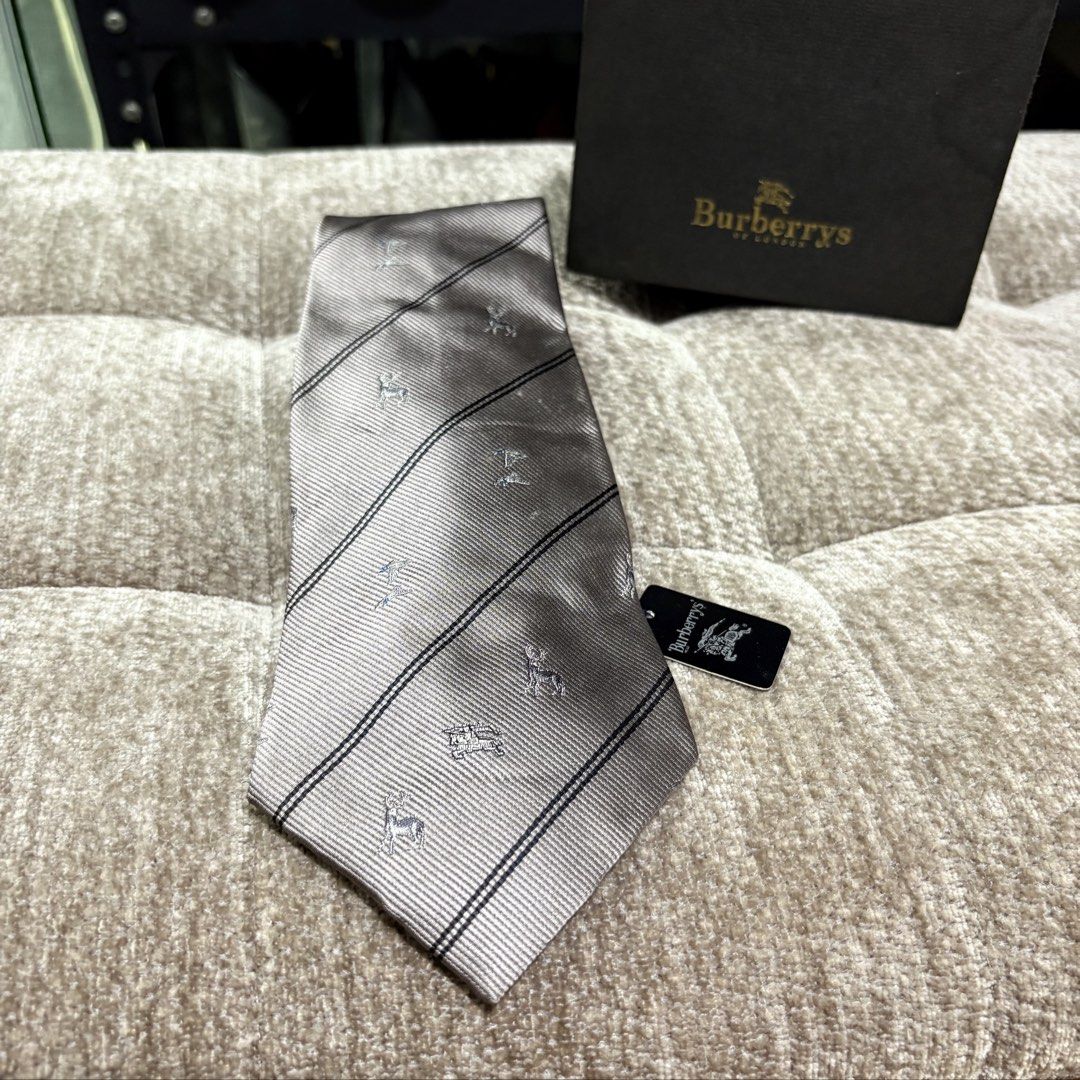 Authentic Burberrys London Grey Neck Tie (Category: Ties) located in Binangonan. Submitted by makoleksyon (Listing ID 1461229594, Image 1). Description: Brand new Dead stock With tag Bought in Japan 💯% Authentic Money back guarantee .