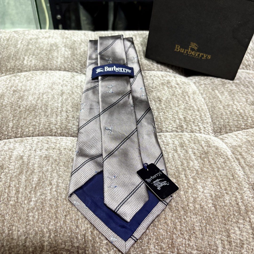 Authentic Burberrys London Grey Neck Tie (Category: Ties) located in Binangonan. Submitted by makoleksyon (Listing ID 1461229594, Image 2). Description: Brand new Dead stock With tag Bought in Japan 💯% Authentic Money back guarantee .