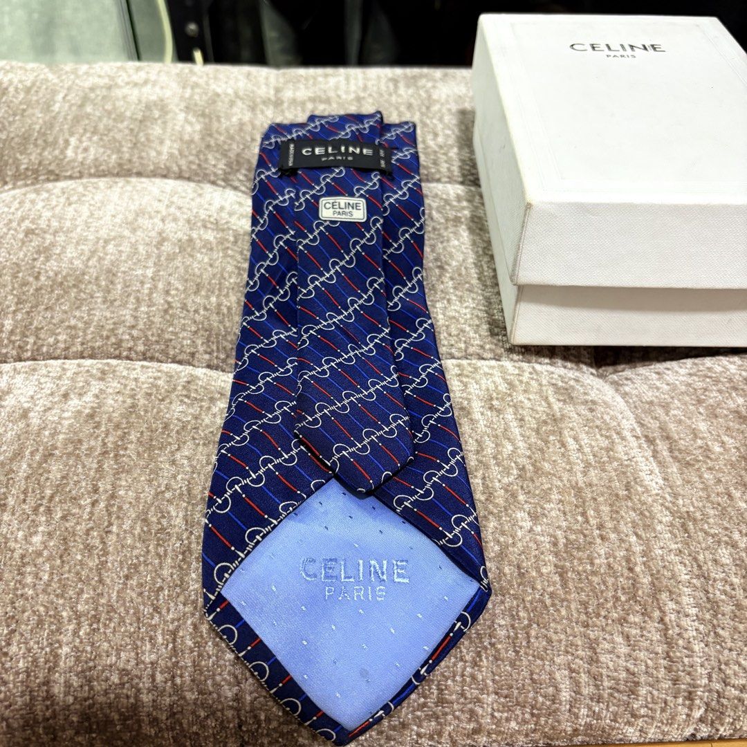 Authentic Celine Navy Blue Neck Tie (Category: Ties) located in Binangonan. Submitted by makoleksyon (Listing ID 1461230594, Image 2). Description: Excellent condition Like new No flaws Bought in Japan 💯% Authentic Money back guarantee .