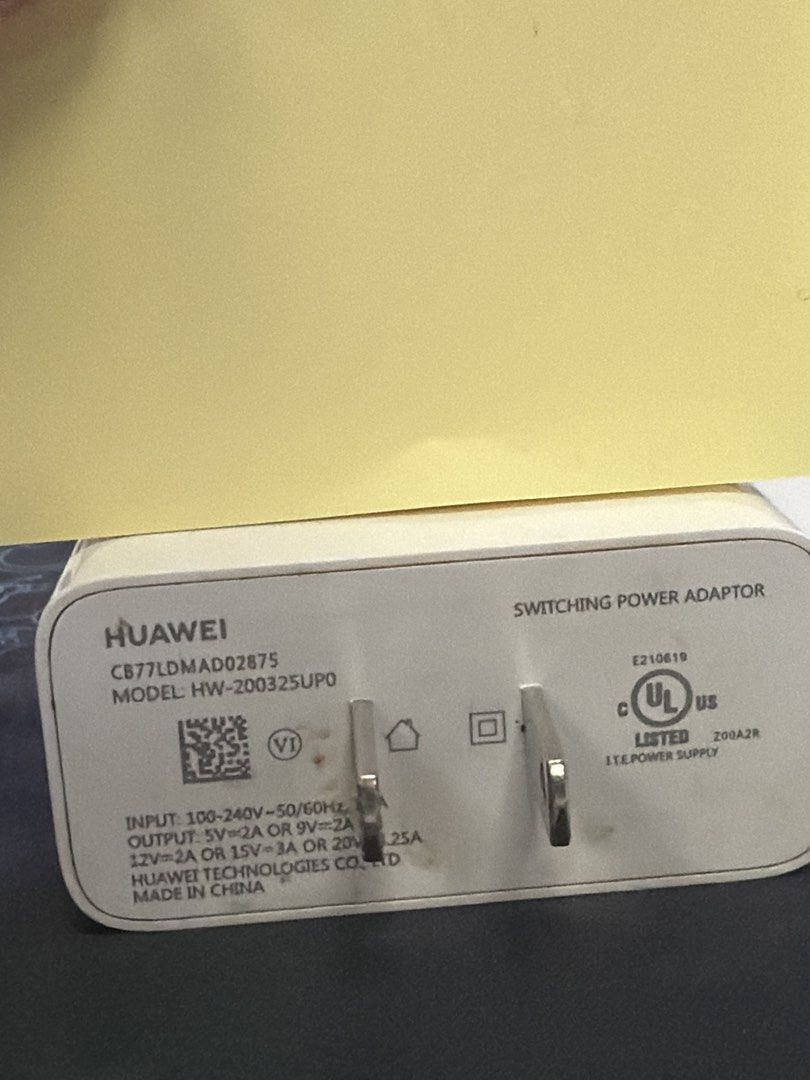authentic HUAWEI charger 65w (Category: Chargers) located in Manila. Submitted by boccy2023 (Listing ID 1461194749, Image 2). Description: - Authentic Huawei 65W charger - Model: HW-200325UPO - Type: Switching Power Adapter - Input: 100-240V~50/60Hz - Output options: 5V=2A or 9V=2A or 15V=3A or 20V=3.25A - Color: White - Condition: Used, good working order - Made in China.