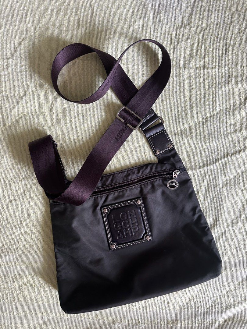 Authentic Longchamp Crossbody (Category: Luxury Bags & Wallets) located in Lipa City. Submitted by bagabonds (Listing ID 1461161381, Image 1). Description: -Chocolate color, good for running errands -Can fit long wallet - mix of nylon and leather material.
