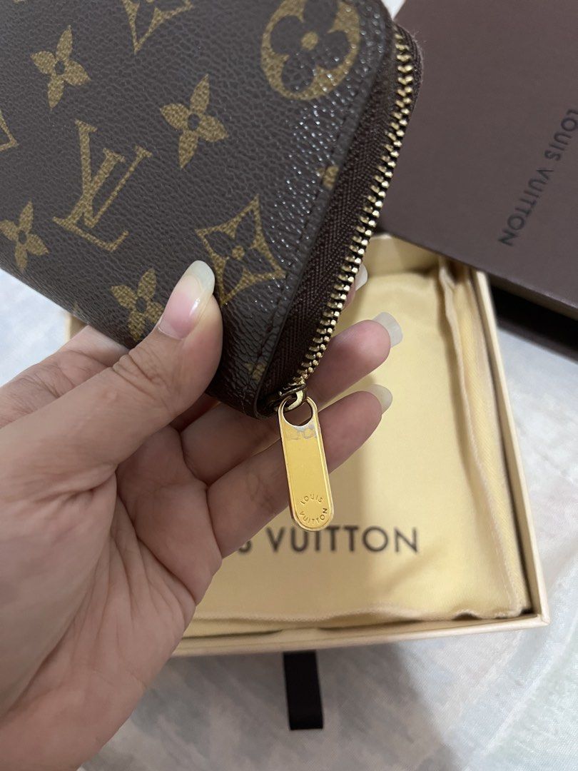 Authentic Louis Vuitton Monogram Wallet (Category: Luxury Bags & Wallets) located in Manila. Submitted by ot7purple (Listing ID 1451769763, Image 3). Description: - Authentic Louis Vuitton Monogram zippy coin purse - Unused with original box and dust bag, giftable - Refer to pictures provided ***Shipping fee not included. 📲IG: sofiajeneve .