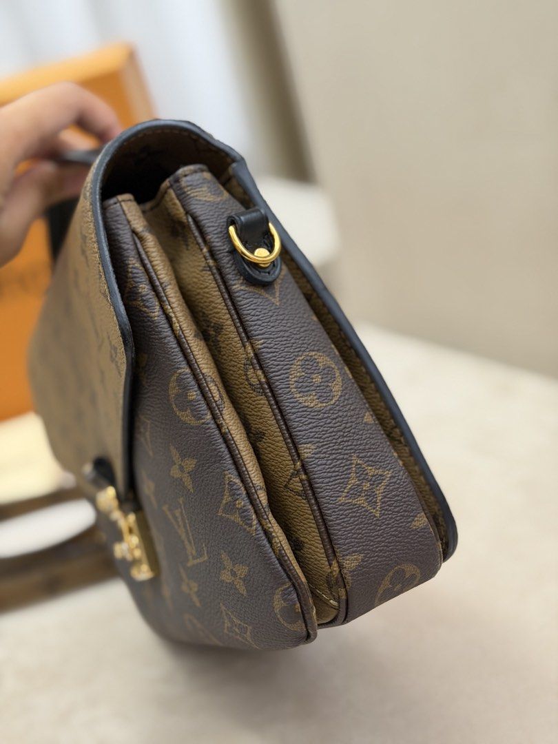 Authentic Louis Vuitton Pochette Reverse Metis (Category: Luxury Bags & Wallets) located in Manila. Submitted by maria_2326 (Listing ID 1461183432, Image 2). Description: Louis Vuitton Pochette Reverse Metis Guarantee Authentic Inclusions: Box, dust bag, long strap and entrupy No lowballing! Location: Manila/QC.