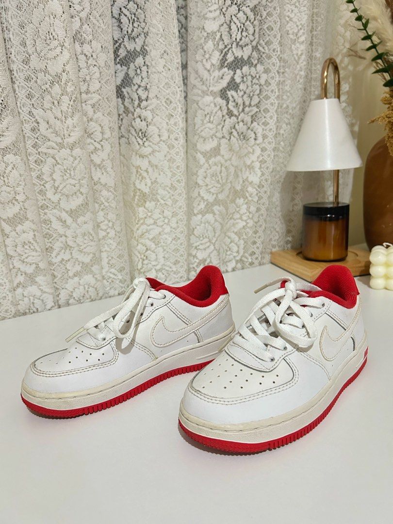 Authentic Nike Force 1 Low (Category: Babies & Kids Fashion) located in Manila. Submitted by maison_marie (Listing ID 1461274677, Image 1). Description: Classic Nike sneakers in white and red color. Features the iconic Swoosh logo, red padded collar and red outsole for a sporty, timeless look. Bought in Canada Condition: Used twice. In very good condition Insole: 20 cm Made in: India Please see photos for the actual condition and details. Locatio