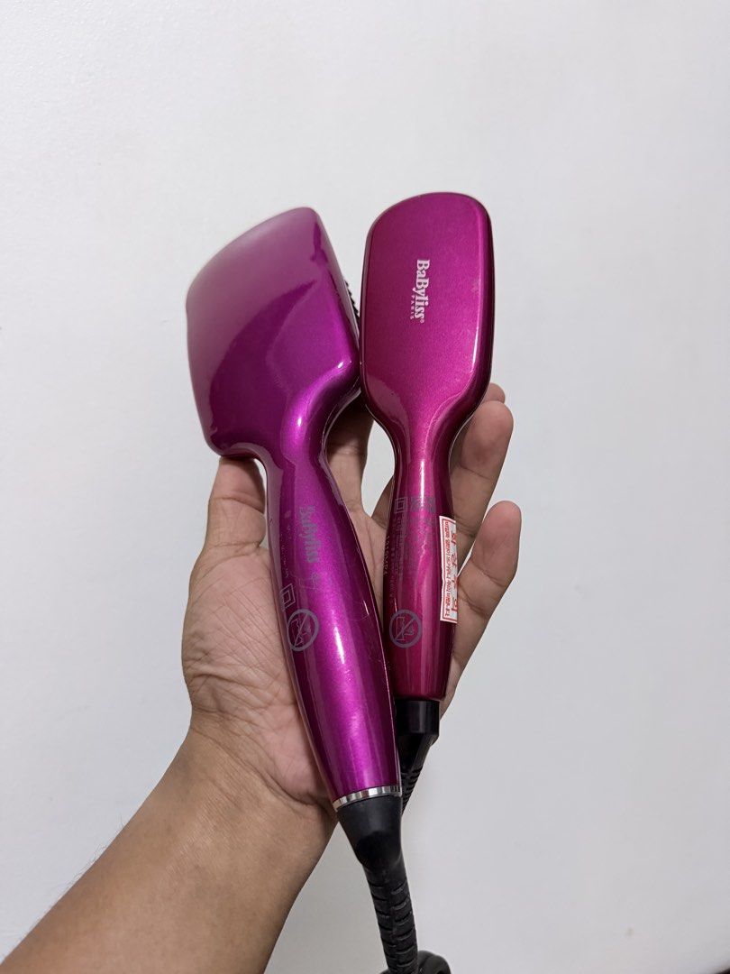 BaByliss Pro Ionic Styler Brush (Category: Hair) located in Pasig City. Submitted by iambernabe (Listing ID 1459215886, Image 2). Description: Take both for 1,500 - Pink BaByliss Pro ionic straightening brush - Tames frizz and straightens hair quickly - Features adjustable heat settings - Corded electric for reliable power - Ideal for quick touch-ups or full styling - Works great!.