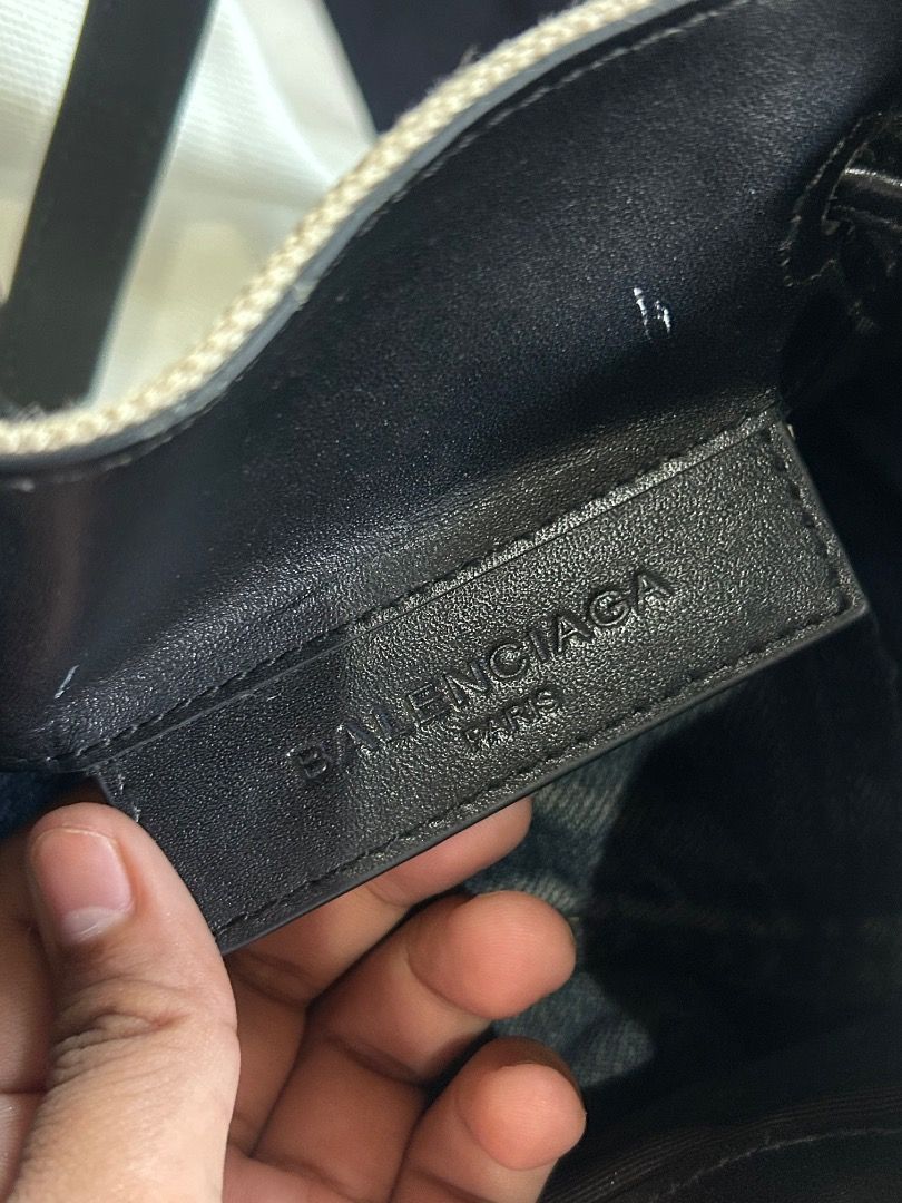 BALENCIAGA CANVAS BUCKET (Category: Luxury Bags & Wallets) located in Mansalay. Submitted by czarithrift2.0 (Listing ID 1461163107, Image 3). Description: BALENCIAGA NAVY BUCKET CANVAS BAG condition: 8/10 - guaranteed authentic - not available balenciaga cabas tote bag large size - free shipping - needs deep cleaning as it has been stored and unused for a long time - minor scratches/scuff marks on the rubber lining of the strap - no other issues 