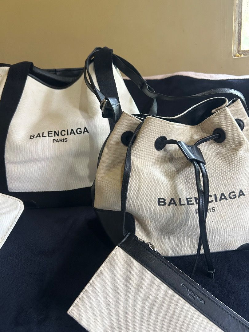 BALENCIAGA CANVAS BUCKET (Category: Luxury Bags & Wallets) located in Mansalay. Submitted by czarithrift2.0 (Listing ID 1461163107, Image 2). Description: BALENCIAGA NAVY BUCKET CANVAS BAG condition: 8/10 - guaranteed authentic - not available balenciaga cabas tote bag large size - free shipping - needs deep cleaning as it has been stored and unused for a long time - minor scratches/scuff marks on the rubber lining of the strap - no other issues 