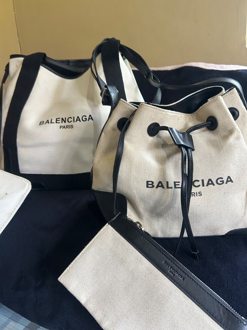 BALENCIAGA CANVAS BUCKET (Category: Luxury Bags & Wallets) located in Mansalay. Submitted by czarithrift2.0 (Listing ID 1461163107, Image 1). Description: BALENCIAGA NAVY BUCKET CANVAS BAG condition: 8/10 - guaranteed authentic - not available balenciaga cabas tote bag large size - free shipping - needs deep cleaning as it has been stored and unused for a long time - minor scratches/scuff marks on the rubber lining of the strap - no other issues 