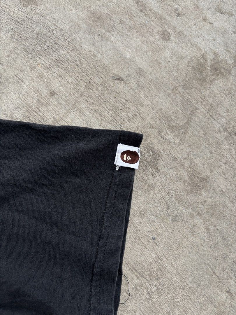 BAPE x BE@RBRICK WGM Tee Black (Category: Tshirts & Polo Shirts ) located in Naga. Submitted by ajrc.shop (Listing ID 1461253285, Image 3). Description: Bape shirt ✅Size: XL ✅Width: 21 ✅Length: 28.5 ✅Color Rate: 9/10 ✅Issue: Hairlines ✅Need Wash ✅Location: Bicol Naga City, Camarines Sur ✅Courier: J&T Express/Flash Express ✅MOP: Gcash only.
