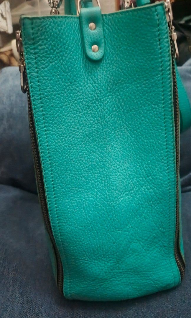 Barbara Rihl Paris (Category: Luxury Bags & Wallets) located in Urdaneta. Submitted by bernalyn25 (Listing ID 1461322599, Image 3). Description: -Barbara Rihl Paris -4-zip Ykk convertible leather tote -Vibrant turquoise/mint green pebbled leather -With signature travel inspired stamp illustration - Can be used as crossbody, shoulder or hand bag.