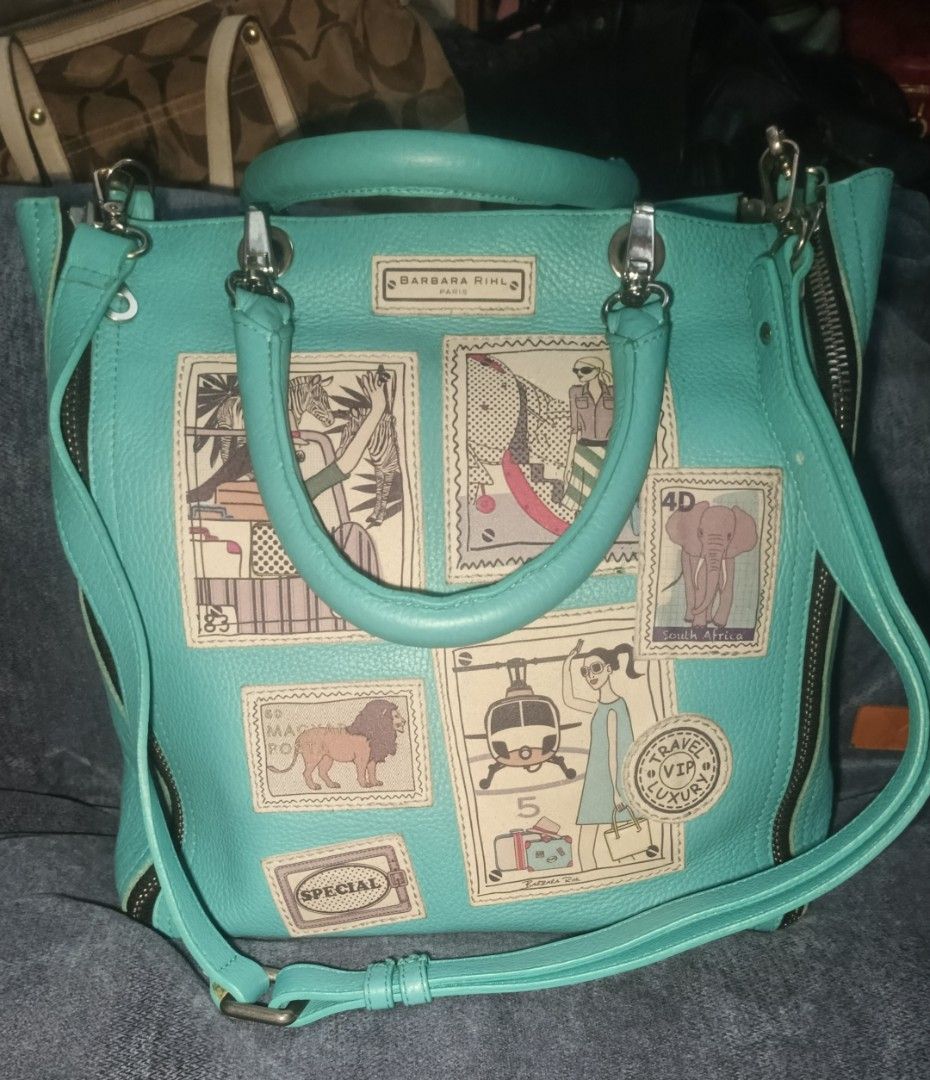 Barbara Rihl Paris (Category: Luxury Bags & Wallets) located in Urdaneta. Submitted by bernalyn25 (Listing ID 1461322599, Image 1). Description: -Barbara Rihl Paris -4-zip Ykk convertible leather tote -Vibrant turquoise/mint green pebbled leather -With signature travel inspired stamp illustration - Can be used as crossbody, shoulder or hand bag.