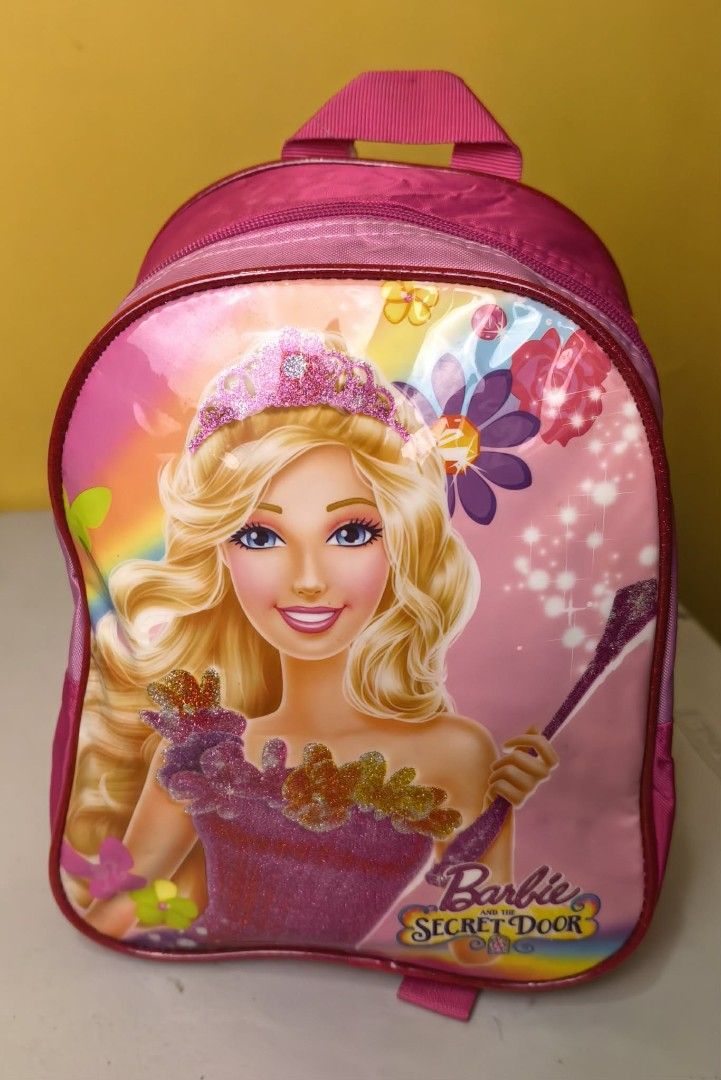 BARBIE SCHOOL BAG (Category: Stationery & School Supplies) located in Quezon City. Submitted by happy.cutie888 (Listing ID 1461145129, Image 1). Description: BARBIE SECRET DOOR BACK PACK small bag for kinder or pre-school. with tag barbie printed inside 650.00 NEGOTIABLE.