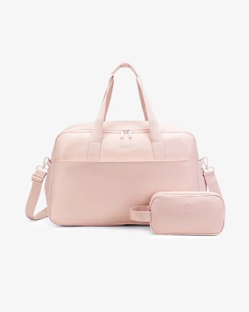 BASH* | Weekender Mono in Sakura (Category: Tote Bags) located in Quezon City. Submitted by avenue.de.belle (Listing ID 1461200965, Image 1). Description: BASH* | Weekender Mono in Sakura • Large Weekender • Brand New with Tag DESCRIPTION Your go-to Weekender, refined. Now fully tonal inside and out, with breathable cotton straps and a hidden top zip for easy access without disrupting its clean silhouette. Pack it up, slip it over your suitcase, 