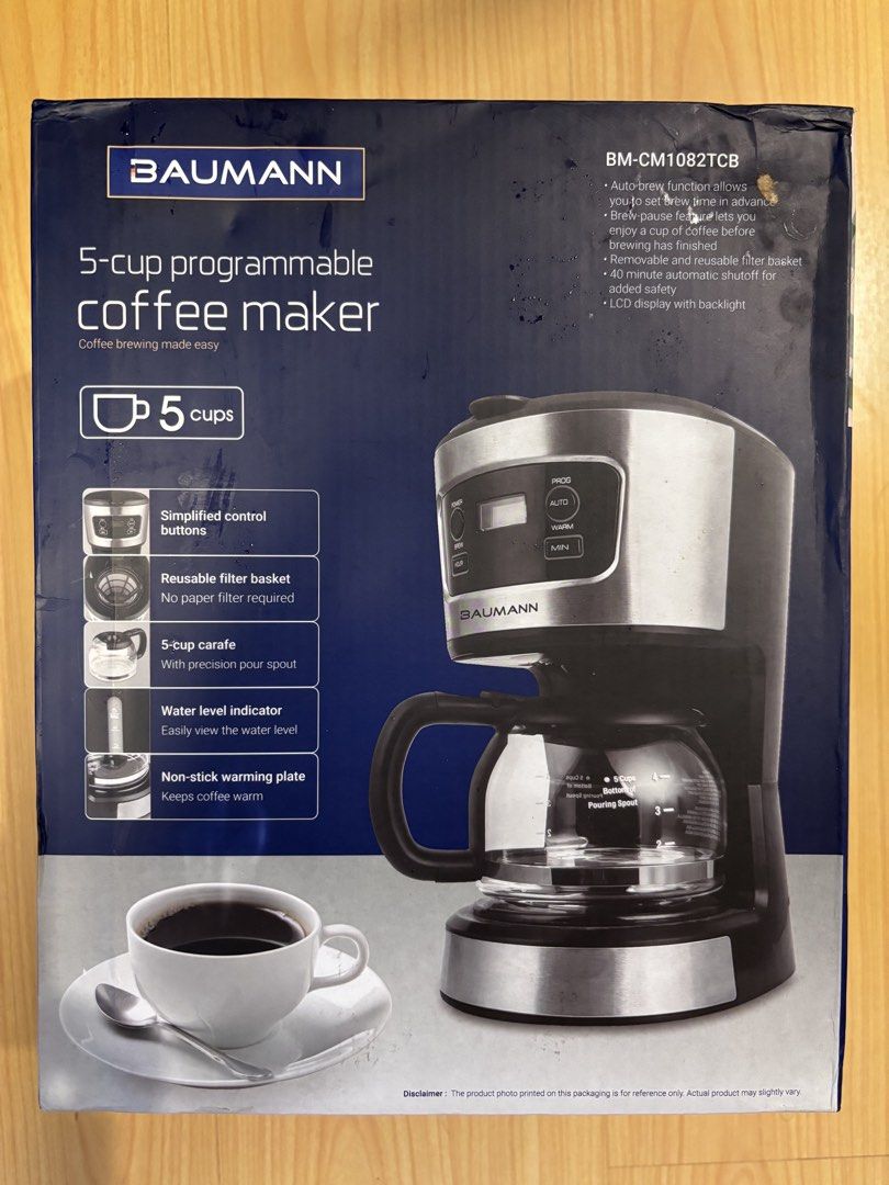 Baumann 5-Cup Programmable Coffee Maker BM-CM1082TCB (Category: Coffee Machines & Makers) located in Mandaluyong City. Submitted by chrisbonus (Listing ID 1461212262, Image 1). Description: - Baumann 5-cup programmable coffee maker - Auto-brew function for coffee ready when you are - Brew pause feature to grab a cup mid-brew - Includes reusable filter basket - Easy-to-read water level indicator - Non-stick warming plate keeps coffee hot - Comes w