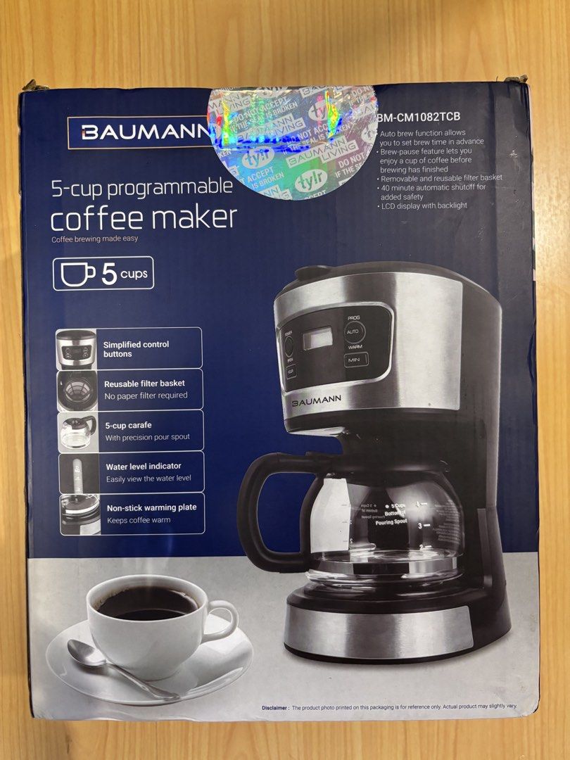 Baumann 5-Cup Programmable Coffee Maker BM-CM1082TCB (Category: Coffee Machines & Makers) located in Mandaluyong City. Submitted by chrisbonus (Listing ID 1461212262, Image 3). Description: - Baumann 5-cup programmable coffee maker - Auto-brew function for coffee ready when you are - Brew pause feature to grab a cup mid-brew - Includes reusable filter basket - Easy-to-read water level indicator - Non-stick warming plate keeps coffee hot - Comes w
