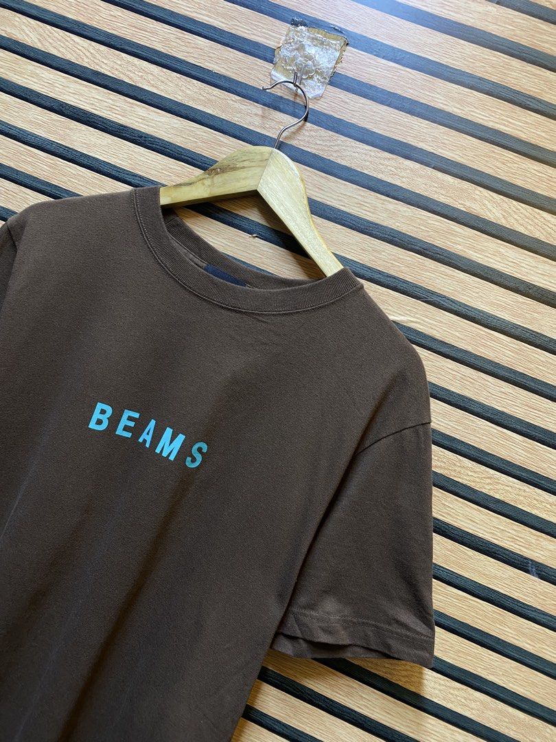 BEAMS LOGO TEE (Category: Tshirts & Polo Shirts ) located in Makati City. Submitted by drip.poww (Listing ID 1461274662, Image 2). Description: - Authentic Beams - Color: Choco brown - Size: Meduim - Dimes: 21x27 - Authentic - Excellent condition - Need wash, fresh from bale - Material: 100% Cotton Please don’t expect too much—these are thrifted (ukay) items. 😊 !!STILL NEGOTIABLE!!.