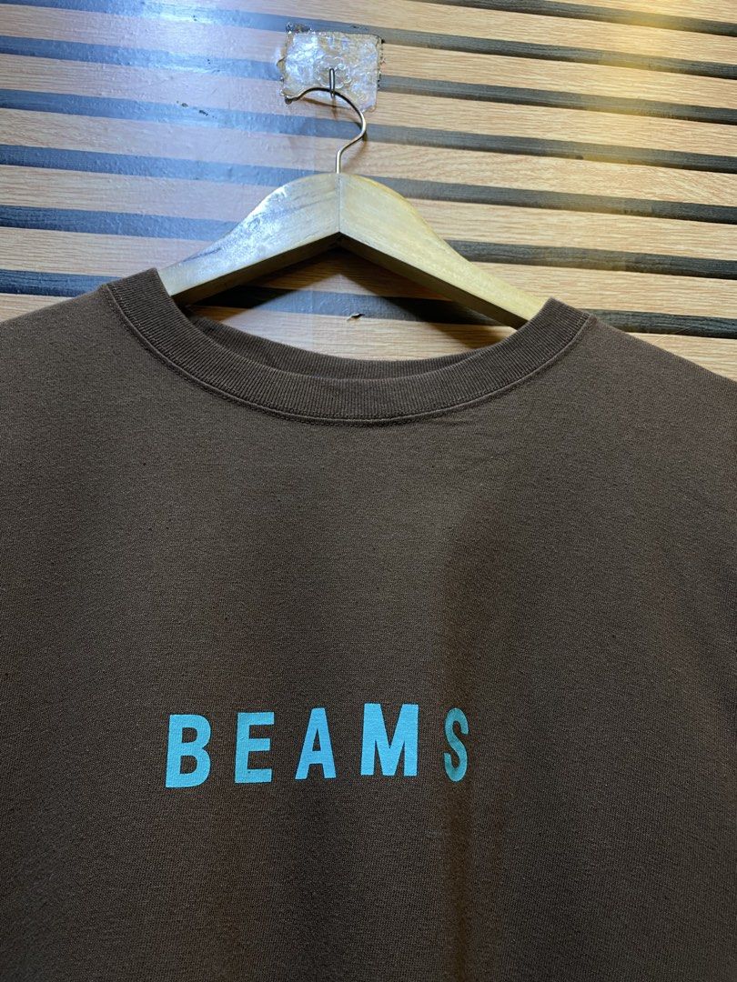 BEAMS LOGO TEE (Category: Tshirts & Polo Shirts ) located in Makati City. Submitted by drip.poww (Listing ID 1461274662, Image 3). Description: - Authentic Beams - Color: Choco brown - Size: Meduim - Dimes: 21x27 - Authentic - Excellent condition - Need wash, fresh from bale - Material: 100% Cotton Please don’t expect too much—these are thrifted (ukay) items. 😊 !!STILL NEGOTIABLE!!.