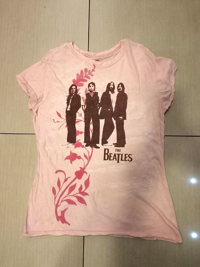 Beatles 2006 graphic tee (Category: Shirts) located in Manila. Submitted by newage.vintage (Listing ID 1461143982, Image 1). Description: -© 2006 apple corps Ltd. - pre loved vintage condition - Beatles print on front - good condition - official merchandise.