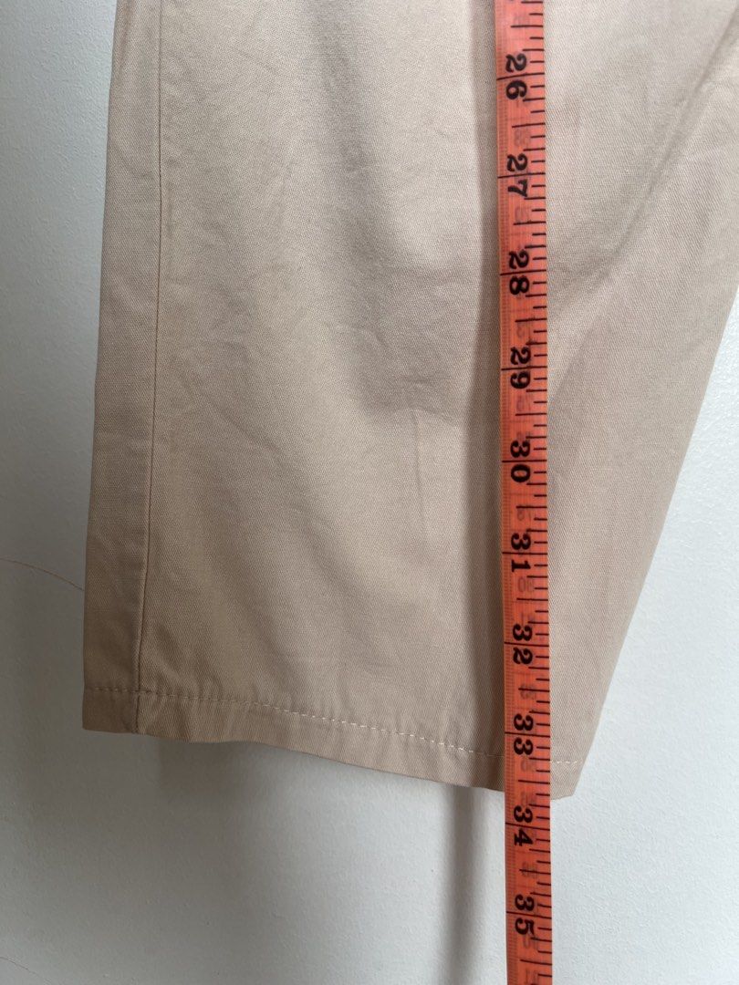Beige Elastic Waist Baggy Pants (Category: Other Bottoms) located in Manila. Submitted by fasteasybuy (Listing ID 1461148788, Image 2). Description: - Comfortable beige pants - 2 pockets - Elastic waistband for easy fit - Classic straight leg cut - Soft, cotton-blend fabric feel - Ideal for casual wear - Versatile for pairing with various tops - Measurements available upon request.