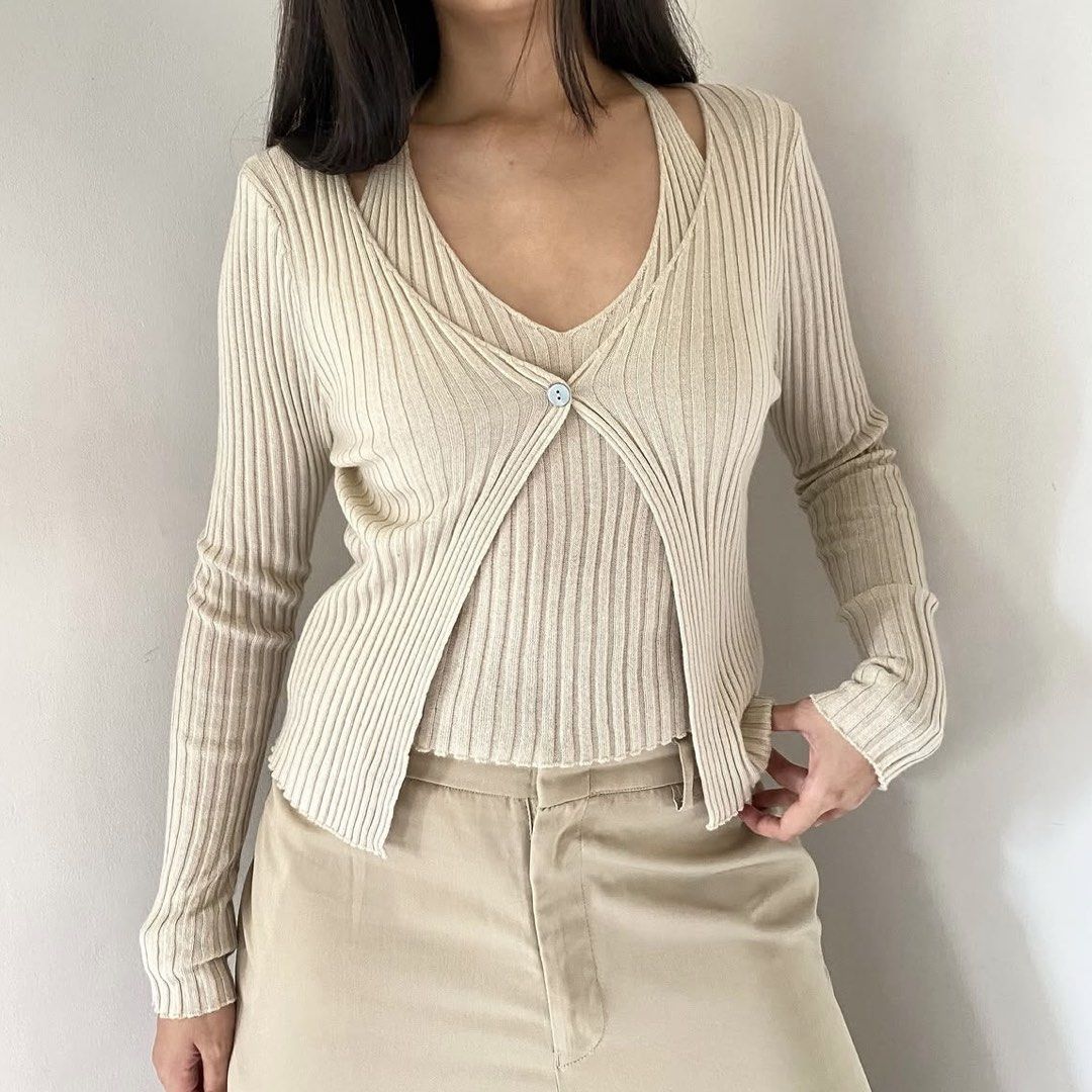 Beige Knit Buttoned Halter Ribbed Double Layer Overlap Cardigan Top (Category: Longsleeves) located in Quezon City. Submitted by danalou (Listing ID 1461223902, Image 1). Description: - Buttoned layered knit long sleeves top -S - Bust can fit until 36", Length 19" - bought from vintheline on ig.