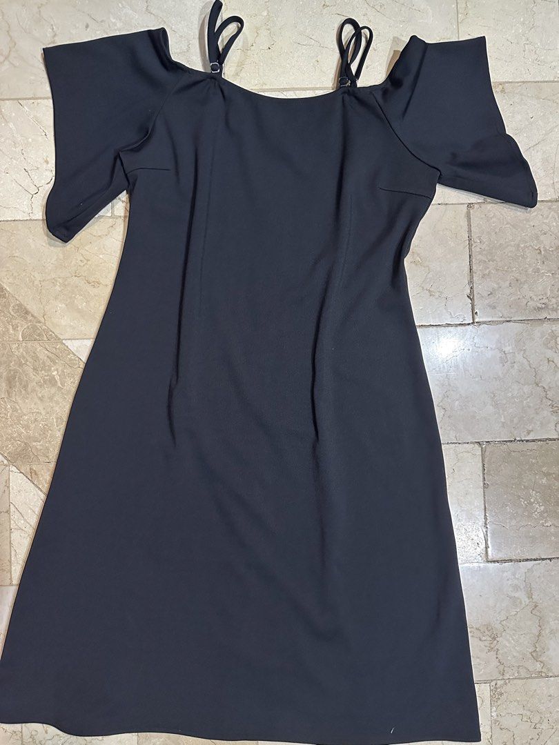 Black casual off shoulder dress (Category: Dresses) located in Manila. Submitted by brownbutterlatte (Listing ID 1461208283, Image 2). Description: Brand new without tag. Never used. Cute dress - flowy design. Can fit S-M! RFS: Not my style. .