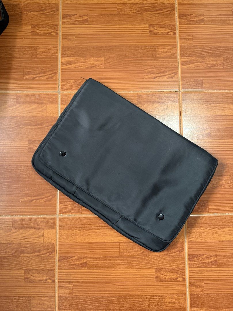 Black Laptop Bag with Multiple Compartments (Category: Laptop Bags & Sleeves) located in Manila. Submitted by prelovedbylkt (Listing ID 1461182123, Image 1). Description: - Stylish black laptop bag (can fit 13-15 in laptop) - Secure flap closure with snap buttons - Multiple interior pockets and compartments for organization - Perfect for carrying your laptop and daily essentials - Simple and functional design.