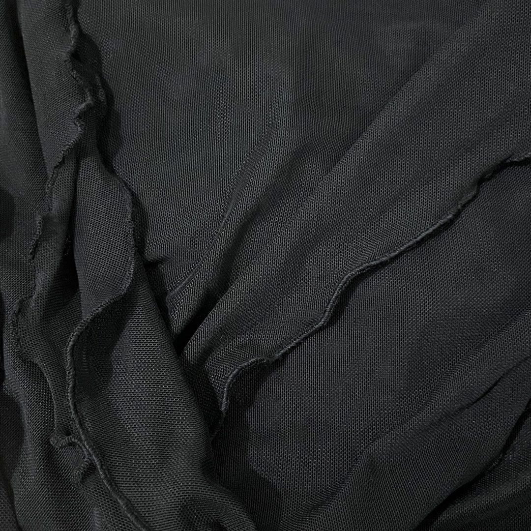 Black Mesh Ruffle Asymmetrical Tube Top (Category: Sleeveless) located in Makati City. Submitted by midnightmelhem (Listing ID 1461134815, Image 2). Description: - Unique black mesh tube top - Features layered ruffle detail on the front - Asymmetrical hemline - Sheer fabric for versatile styling - Great for layering or wearing on its own.