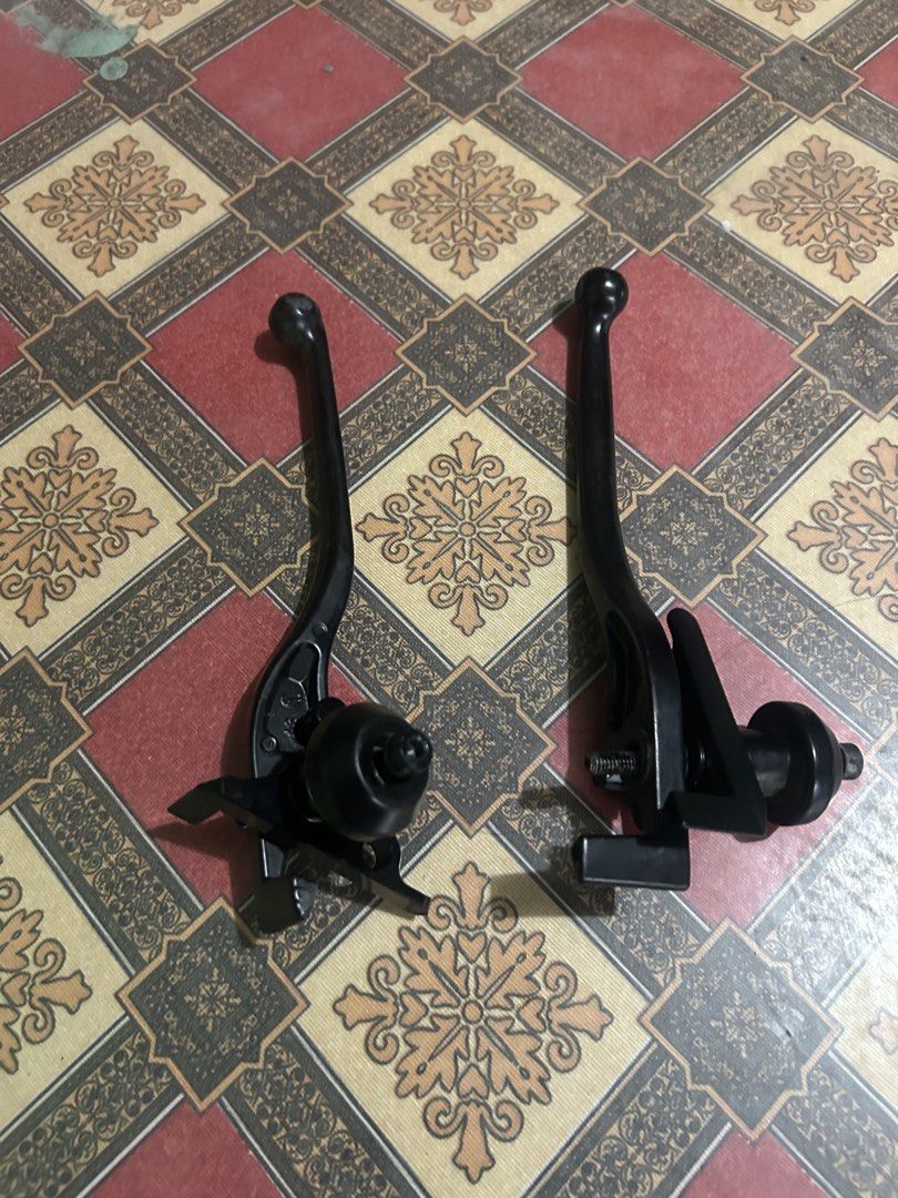 Black Motorcycle Brake Levers Set (Category: Bicycles) located in Manila. Submitted by ravereyes (Listing ID 1461192428, Image 1). Description: - Pair of black Motorcycle brake levers - Standard fit for most motorcycle - Feel free to ask any questions!.