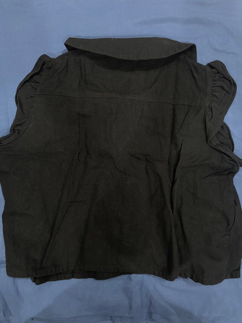 Black Peter Pan Collar Blouse with Ruffle Sleeves (Category: Blouses) located in Manila. Submitted by escherichiaa (Listing ID 1461294336, Image 2). Description: - Cute black blouse - Features a classic Peter Pan collar - Short sleeves with a ruffled detail - Button-up front for easy wear - Pintuck details on the bodice add a touch of elegance - Versatile for sweet or gothic looks - Pairs well with skirts or high-waisted pants.