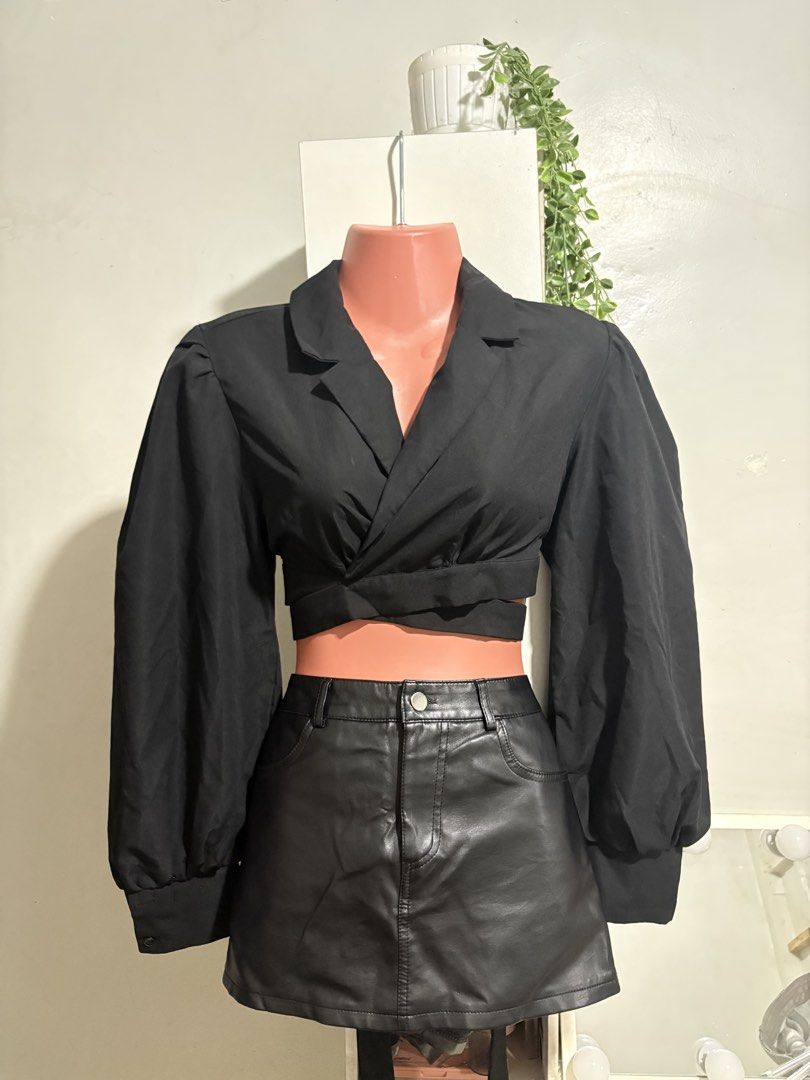 Black Puff Sleeve Wrap Crop Top (Category: Others Tops) located in Manila. Submitted by iranicole12 (Listing ID 1461256059, Image 1). Description: - Stylish black wrap crop top - Features trendy puff sleeves - Flattering V-neckline with a twisted front detail - Perfect for dressing up or down - Ideal for night outs or chic daytime looks - Comfortable and fashionable.