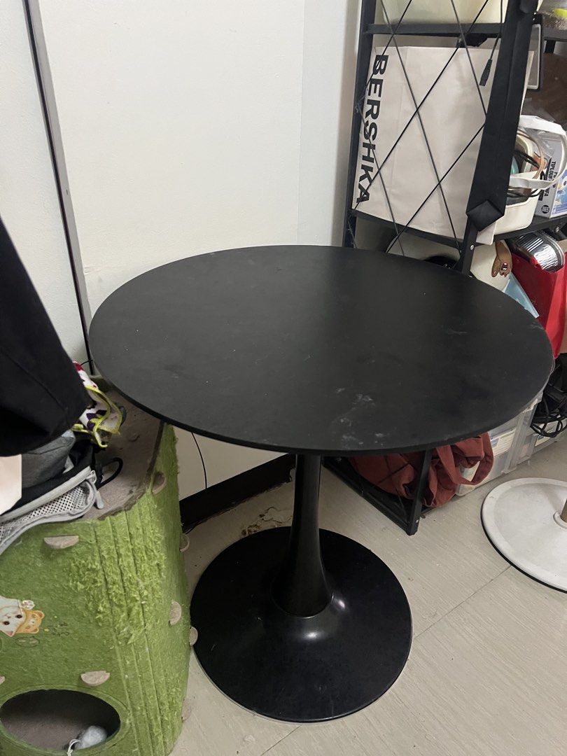Black Round Tulip Style Dining Table (Category: Tables & Sets) located in Manila. Submitted by magnuscastle (Listing ID 1461226011, Image 3). Description: - Black round dining table - Elegant tulip base design - Ideal for small spaces or as a side table - Sturdy and stable construction - Minor scuffs on surface from normal use - Selling because of redecoration - Pick up only.