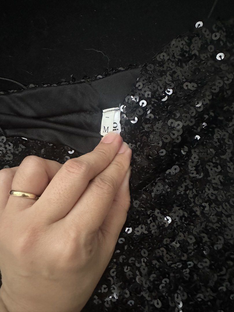 Black Sequin Strappy Mini Dress (Category: Dresses) located in Manila. Submitted by ghesaydokes08 (Listing ID 1461273550, Image 1). Description: - Sparkly black sequin mini dress - Features a strappy design - Ideal for parties or nights out - Looks stunning under lights - Tag size: M.