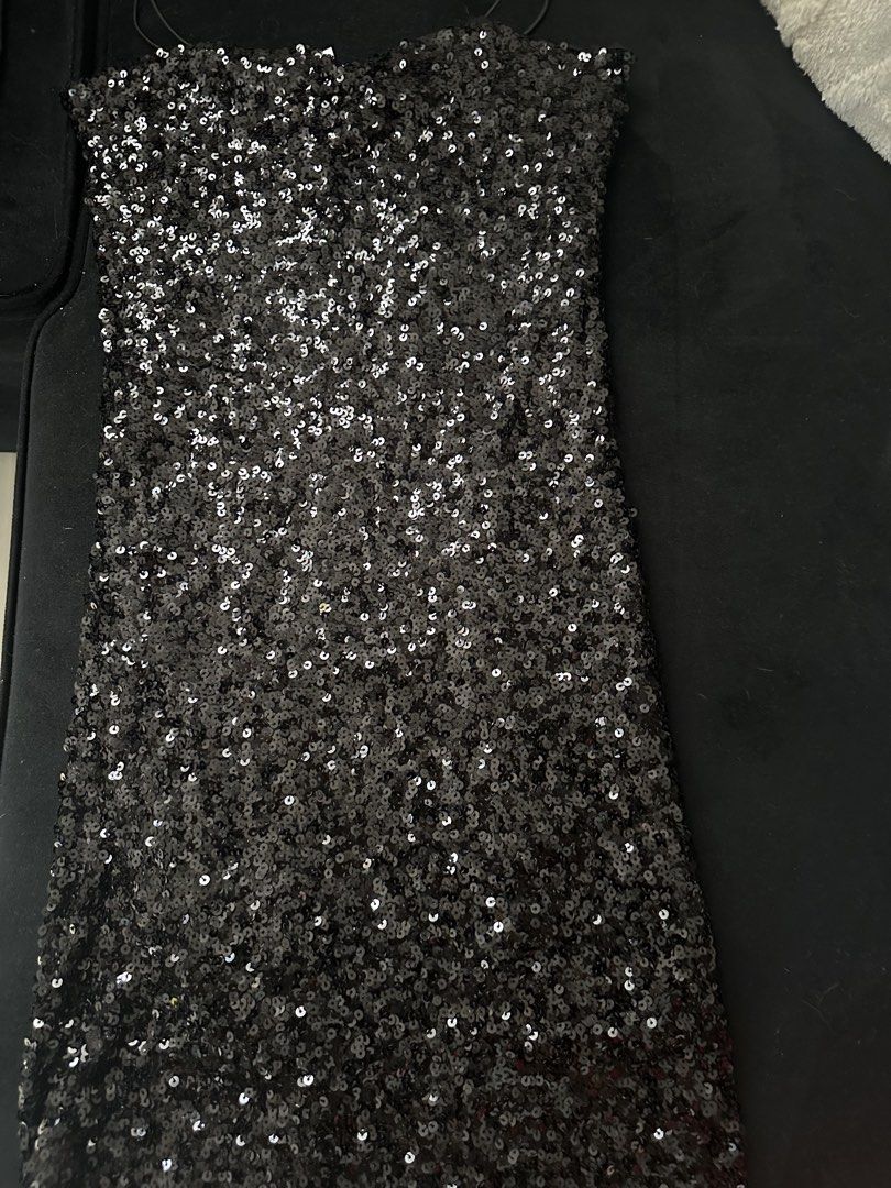 Black Sequin Strappy Mini Dress (Category: Dresses) located in Manila. Submitted by ghesaydokes08 (Listing ID 1461273550, Image 2). Description: - Sparkly black sequin mini dress - Features a strappy design - Ideal for parties or nights out - Looks stunning under lights - Tag size: M.