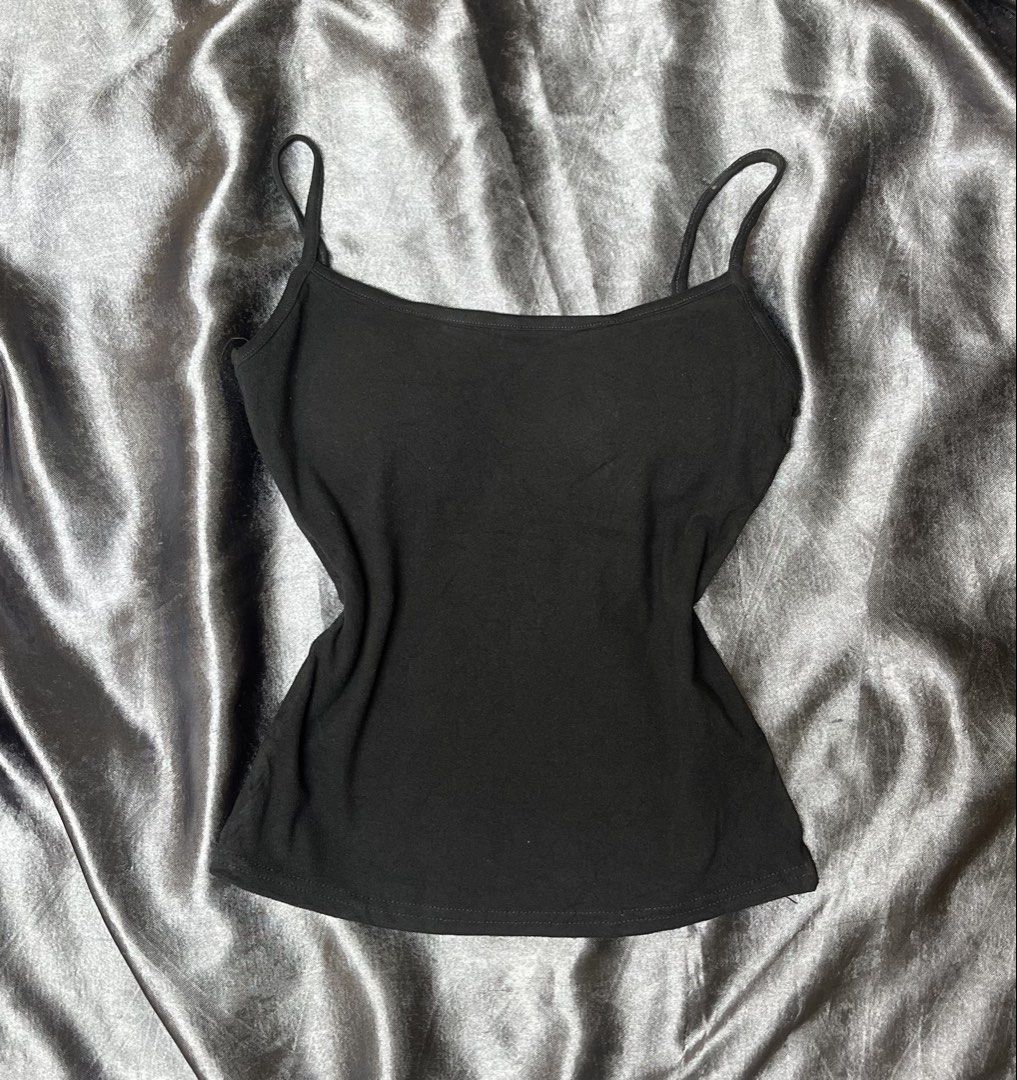 Black Spaghetti Strap Tank Top (Category: Sleeveless) located in Cavite. Submitted by bellewii (Listing ID 1461065305, Image 1). Description: - Basic black spaghetti strap tank top - Stretchy material for a comfortable fit - Perfect for layering or wearing solo - A versatile wardrobe essential, easy to pair with any outfit.