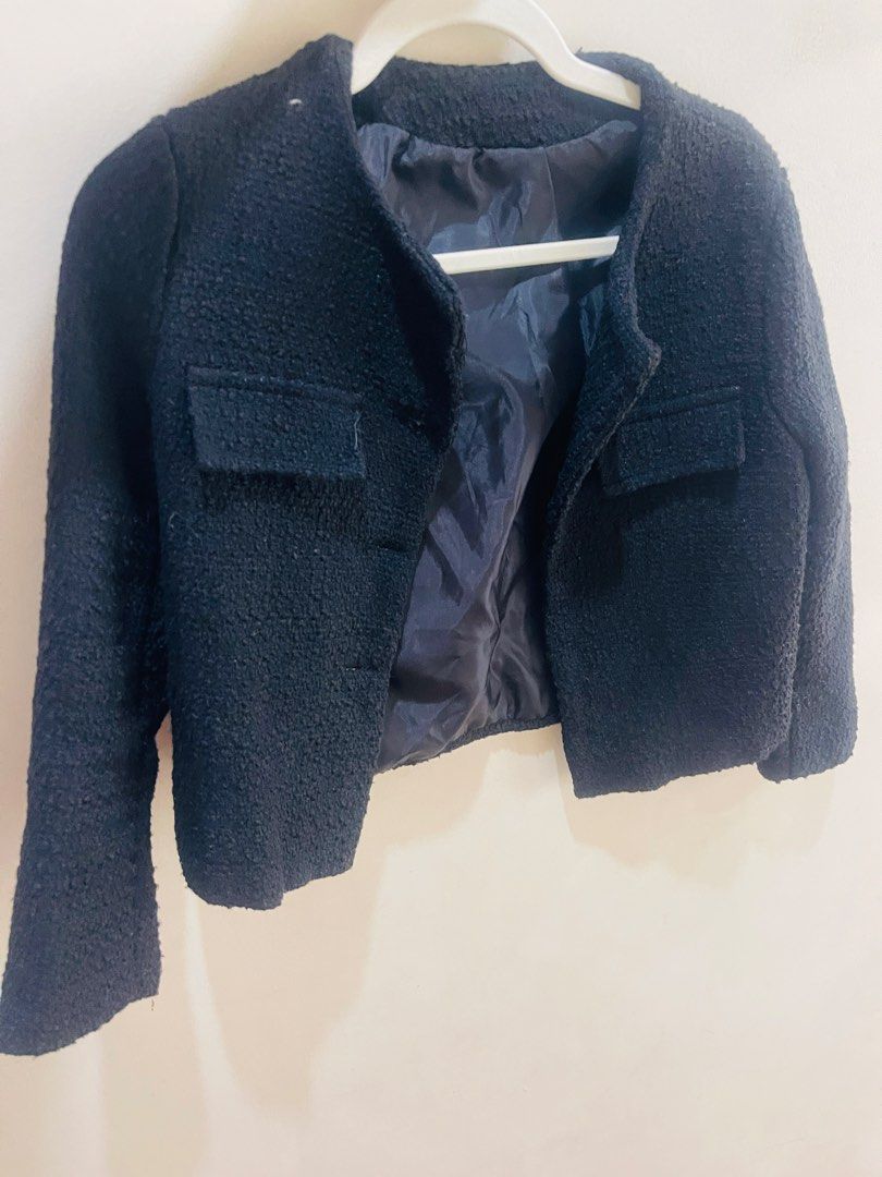 Black Tweed Jacket Blazer (Category: Coats, Jackets and Outerwear) located in Quezon City. Submitted by prelovedluxe_ (Listing ID 1459937503, Image 2). Description: Elegant and timeless black open style tweed jacket featuring a textured woven finish. Designed with a structured, slightly cropped silhouette, round neckline, long sleeves, and flap pockets for a refined yet versatile look. The jacket is fully lined. Easy to dress up or down—pair it w