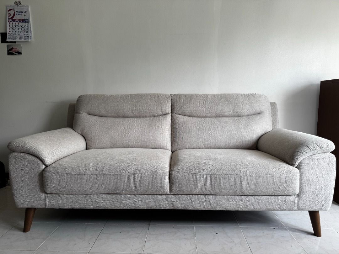 BLIMS Suzy 3-Seater Grey Fabric Sofa (Category: Sofas) located in Quezon City. Submitted by viardomc (Listing ID 1461227539, Image 2). Description: BLIMS Suzy 3-seater sofa in grey fabric, bought around 2024. Used in a one-person home. Minor cat scratch snags and pilling on the seats, front and back—please see the photos. No known cushion, frame or odor issues. Cushion is still bouncy & frame still sturdy. See photos for dimensions. ₱12,000, nego