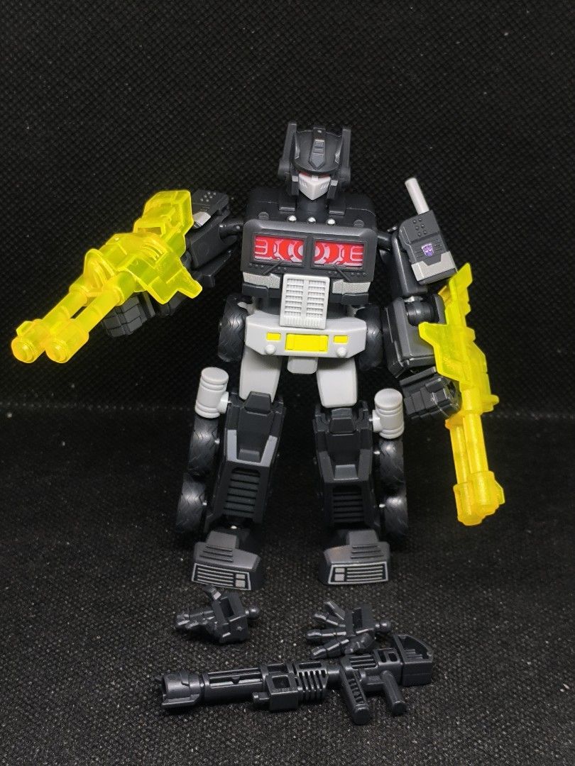 Blokees Transformers Nemesis Prime Action Figure with Accessories (Category: Action & Battle Toys) located in Bacoor. Submitted by patrickpy063765 (Listing ID 1461297490, Image 1). Description: - Nemesis Prime action figure - Features red eye details and a grey chest piece - Comes with 2 yellow energy blasters - All accessories shown are included - Ideal for any Transformers fan.